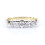 An 18ct gold 5-stone graduated diamond ring, setting height 4.3mm, size N, 2.6g