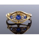 An 18ct gold 7-stone sapphire and diamond ring, setting height 8.6mm, size O, 2.7g