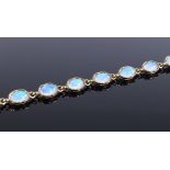 A 9ct gold opal panel bracelet, length 180mm, 5g