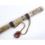 A Japanese carved bone sword, circa 1900, overall length 60cm