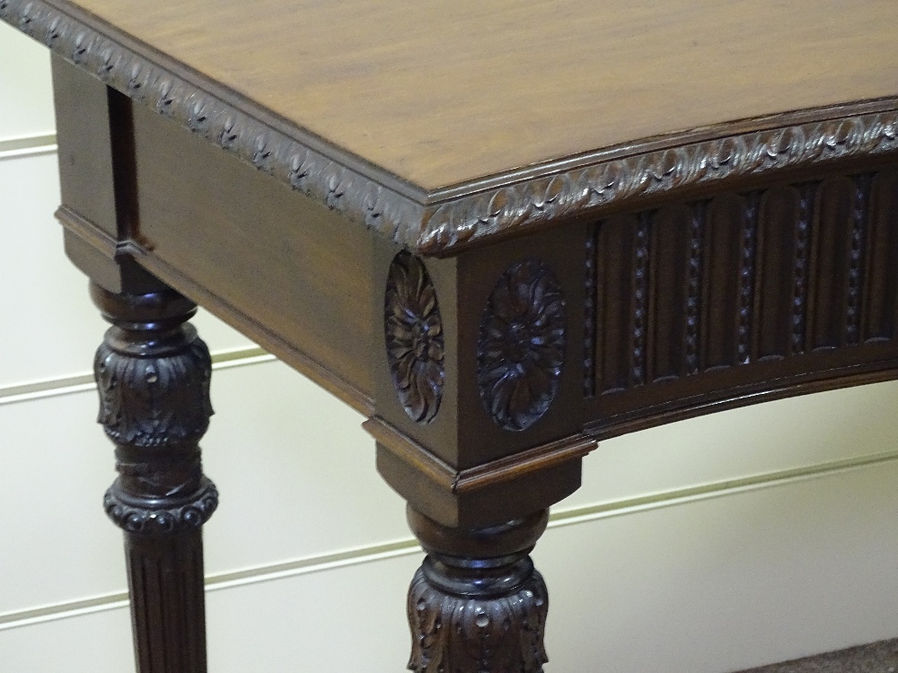 An Edwardian mahogany serpentine front serving table, with carved frieze, raised on turned and - Image 3 of 4