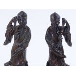A pair of Chinese patinated bronze standing figures, circa 1900, height 26cm