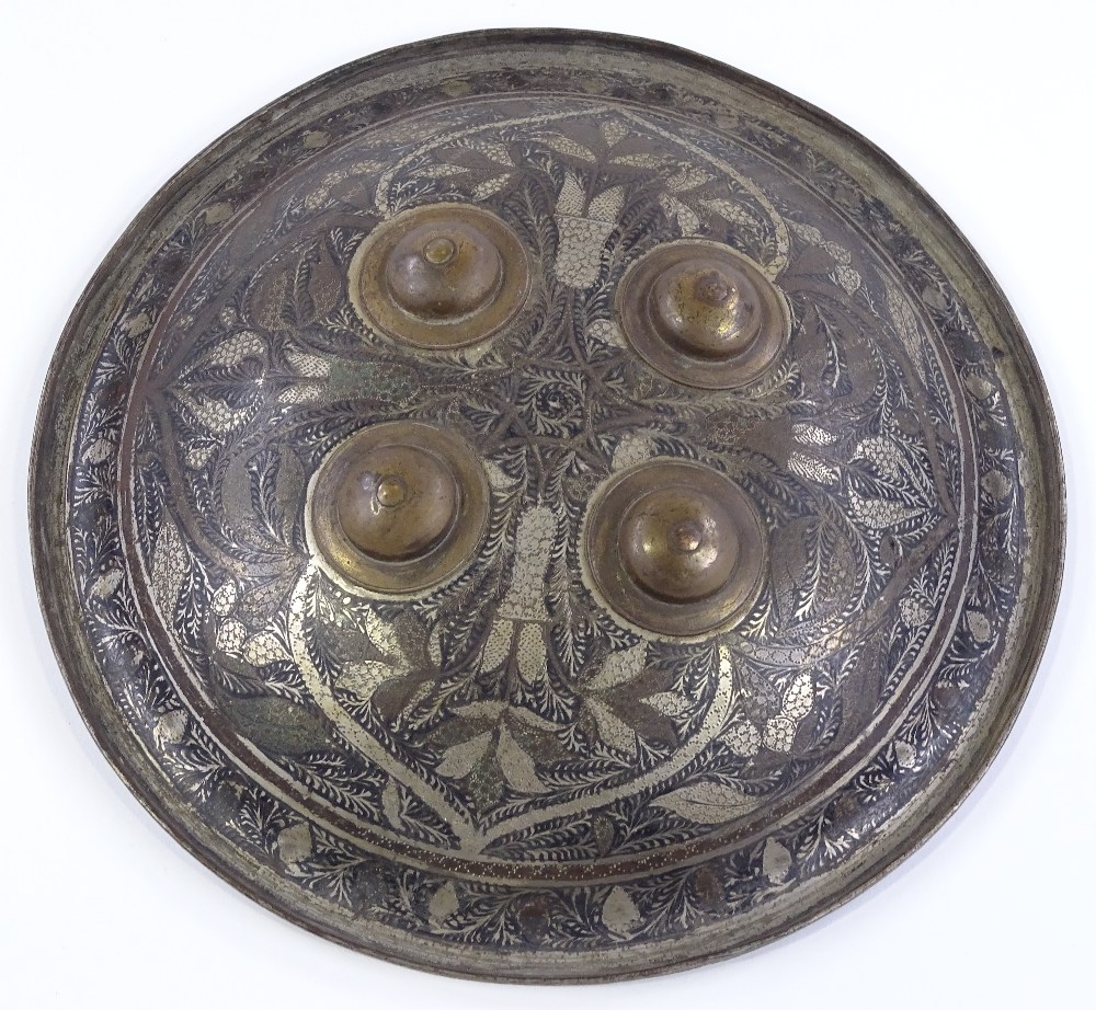 A 19th century Islamic metal shield, with inlaid floral decoration and brass bosses, diameter 26cm - Image 2 of 4