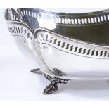 An oval silver fruit bowl, with pierced and bright-cut engraved edges, by Atkin Brothers,