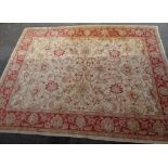 A large cream ground Zigler wool Afghan rug, 11'10" x 9'1"