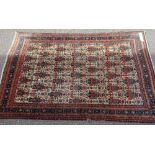 A Vintage Abadeh Persian rug, with repeating vase design on ivory ground, 7' x 4'8"