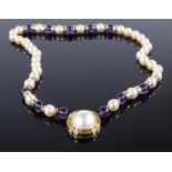 A single strand pearl and amethyst bead necklace, with gold spacers and 9ct gold clasp, length 16"