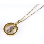 An 18ct gold 3-stone diamond band pendant necklace, on 9ct curb link chain, maker's marks PNF,
