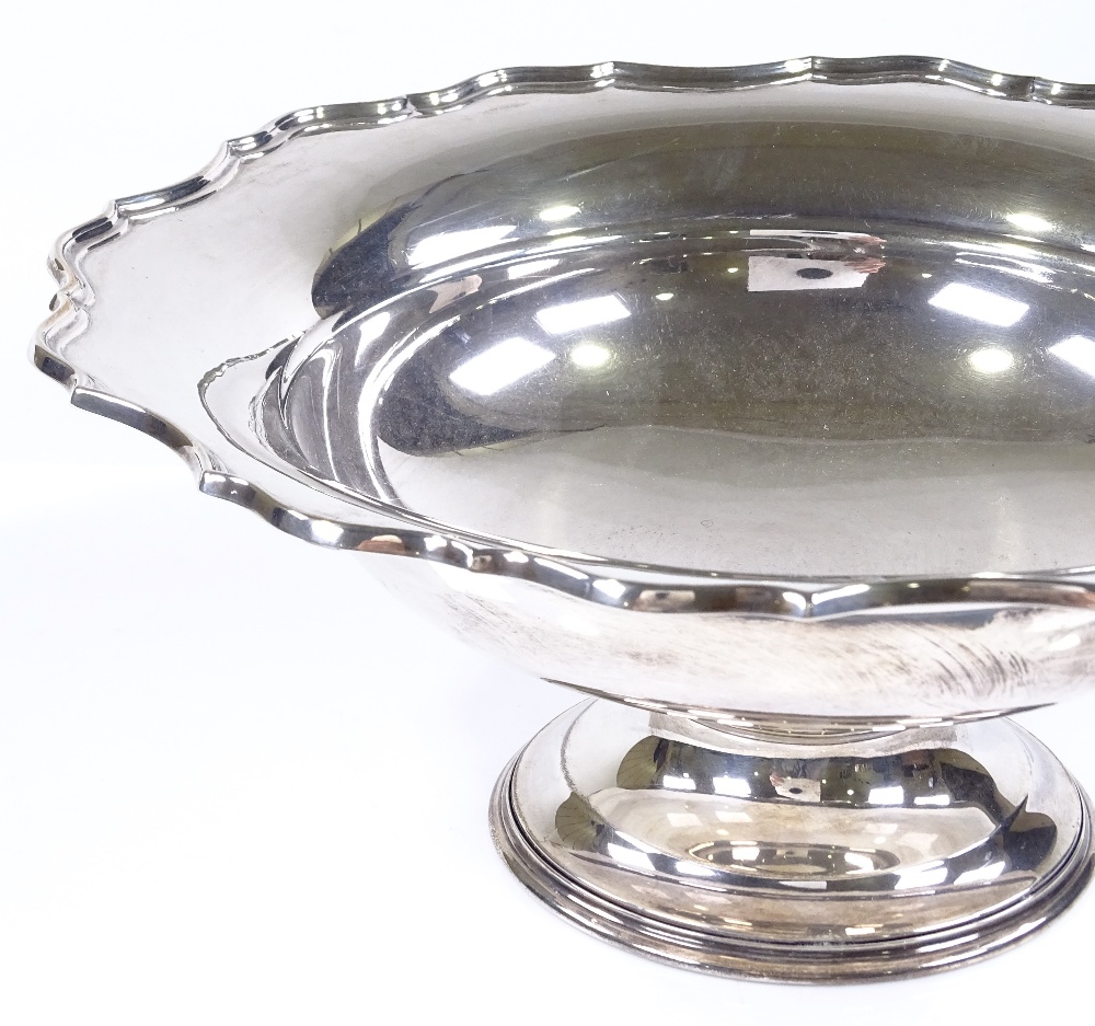 A large circular silver table centre fruit bowl, with scalloped rim, by Barker Brothers, hallmarks