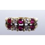 An 18ct gold 5-stone ruby and diamond ring, setting height 3.9mm, size O, 2.6g