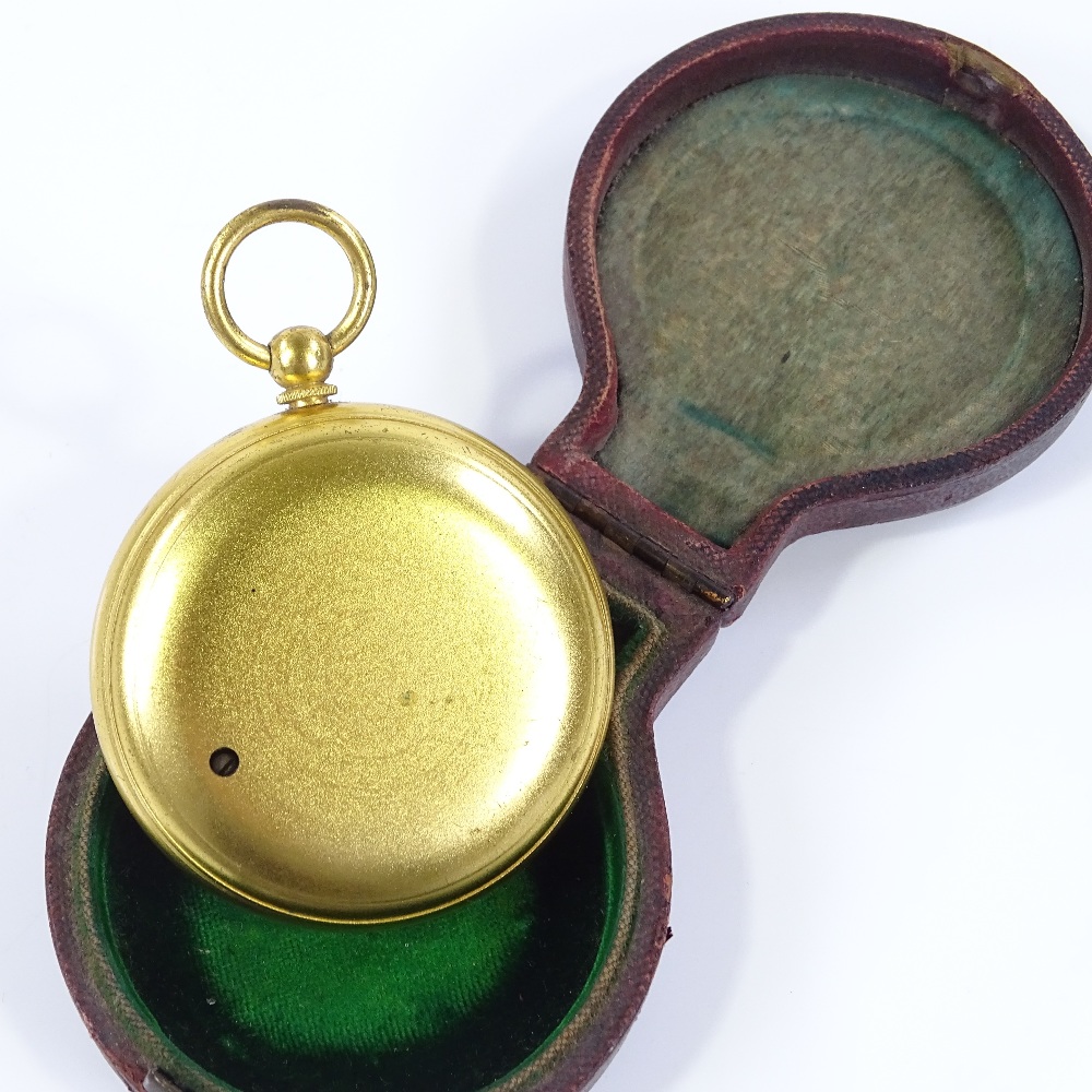 A 19th century pocket barometer, with silvered dial, gilt-metal case, in original red leather - Image 3 of 3