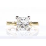 A 1.43ct Princess-cut solitaire diamond ring, 18ct gold settings, maker's marks HM, diamond