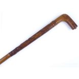A Victorian Balmoral carved wood walking stick, belonging to the Rt Hon Henry Chaplin MP Stafford