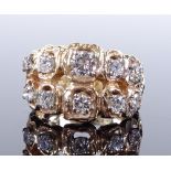 A 14ct gold abstract diamond set ring, largest diamond approx 0.32ct, maker's marks CKG, setting