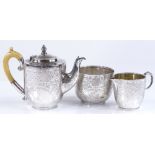 A Victorian 3-piece silver batchelor's tea set, with floral and lattice work engraving, with ivory
