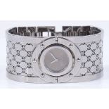 A lady's Gucci bangle design quartz wristwatch, stainless steel case with swivel dial, model no.