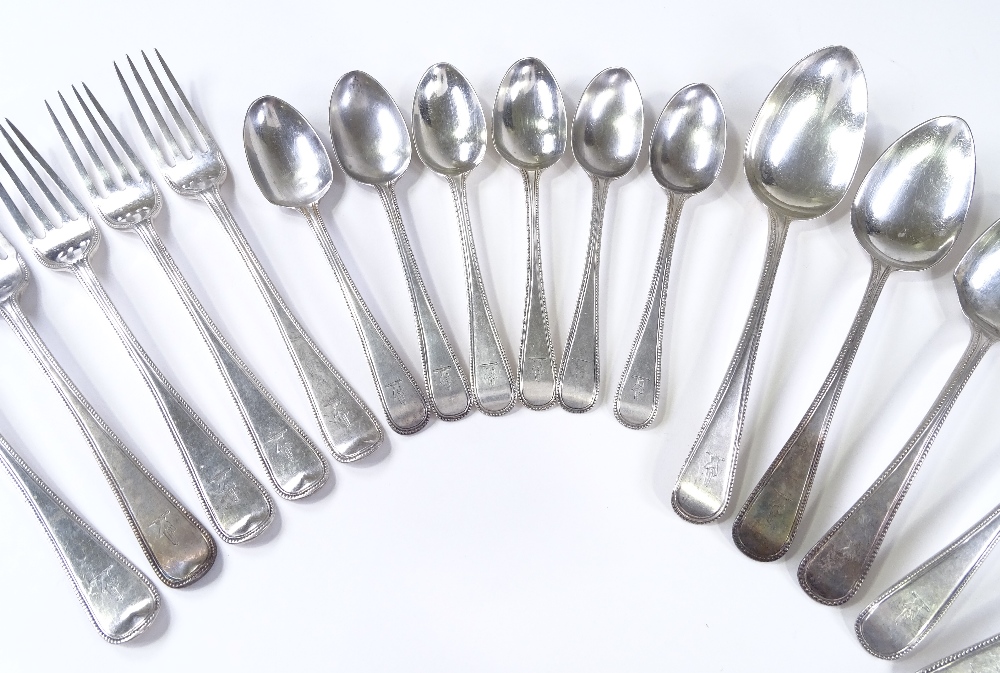 A quantity of silver bead edge cutlery, including forks and spoons, 14oz total