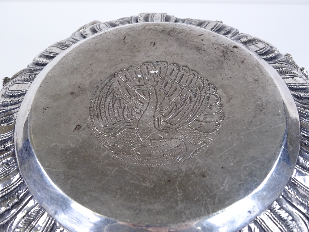 A large Burmese silver Thabeik bowl, with high relief battle scenes and peacock mark on base, - Image 4 of 4