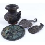 A group of Oriental bronze items, including a bronze mirror, diameter 8cm (4)