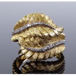 An 18ct gold diamond set double New Zealand Fern ring, with textured leaves, maker's marks RHB,