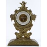 A Victorian cast-bronze cased desk barometer, supported by Classical figures, height 25cm