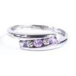 A 9ct white gold 5-stone pink sapphire and diamond crossover ring, setting height 4.8mm, size M, 1.