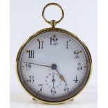A Victorian brass drum-cased travelling alarm clock, with enamel dial, striking on a bell,
