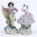 A pair of Continental porcelain dancing figures, height 18cm