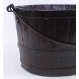 A metal-bound stained wood oyster bucket, with iron swing handle, length 58cm