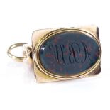 A 9ct gold bloodstone set seal fob, with foliate engraved border, height 25.4mm, 4.5g