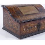 An 18th century Dutch marquetry and walnut desktop box, with serpentine-shaped lid and boxwood and