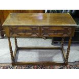 A 19th century oak side table, with 2 short drawers and barleytwist legs, width 3'3", height 2'6"