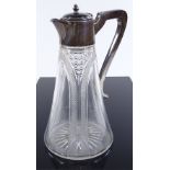 An Edwardian cut-glass and silver-mounted claret jug, hallmarks Birmingham 1910, height 24cm