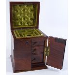A Victorian walnut jewel casket with rising top, 2 front doors enclosing a fitted interior, height