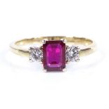 An unmarked gold 3-stone ruby and diamond ring, emerald-cut ruby approx 0.77ct, settings test as