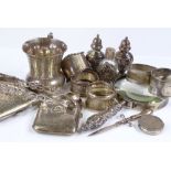 Various silver items, including a thistle shaped mug, a curved cigarette case, napkin rings etc,