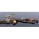 An 18ct gold diamond set bar brooch, 15ct gold sapphire and pearl bar brooch, 15ct diamond set