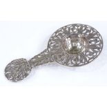A Continental silver tea strainer, with pierced foliate surround, maker's marks L Berth, stamped