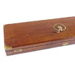 A Victorian brass-bound mahogany shot gun case, with brass-ring carrying handle