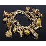 A 9ct gold double-row curb link charm bracelet, set with 12 charms, 53.4g