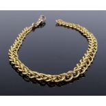 An unmarked gold graduated fancy link chain, settings test as high carat, length 290mm, 20.3g