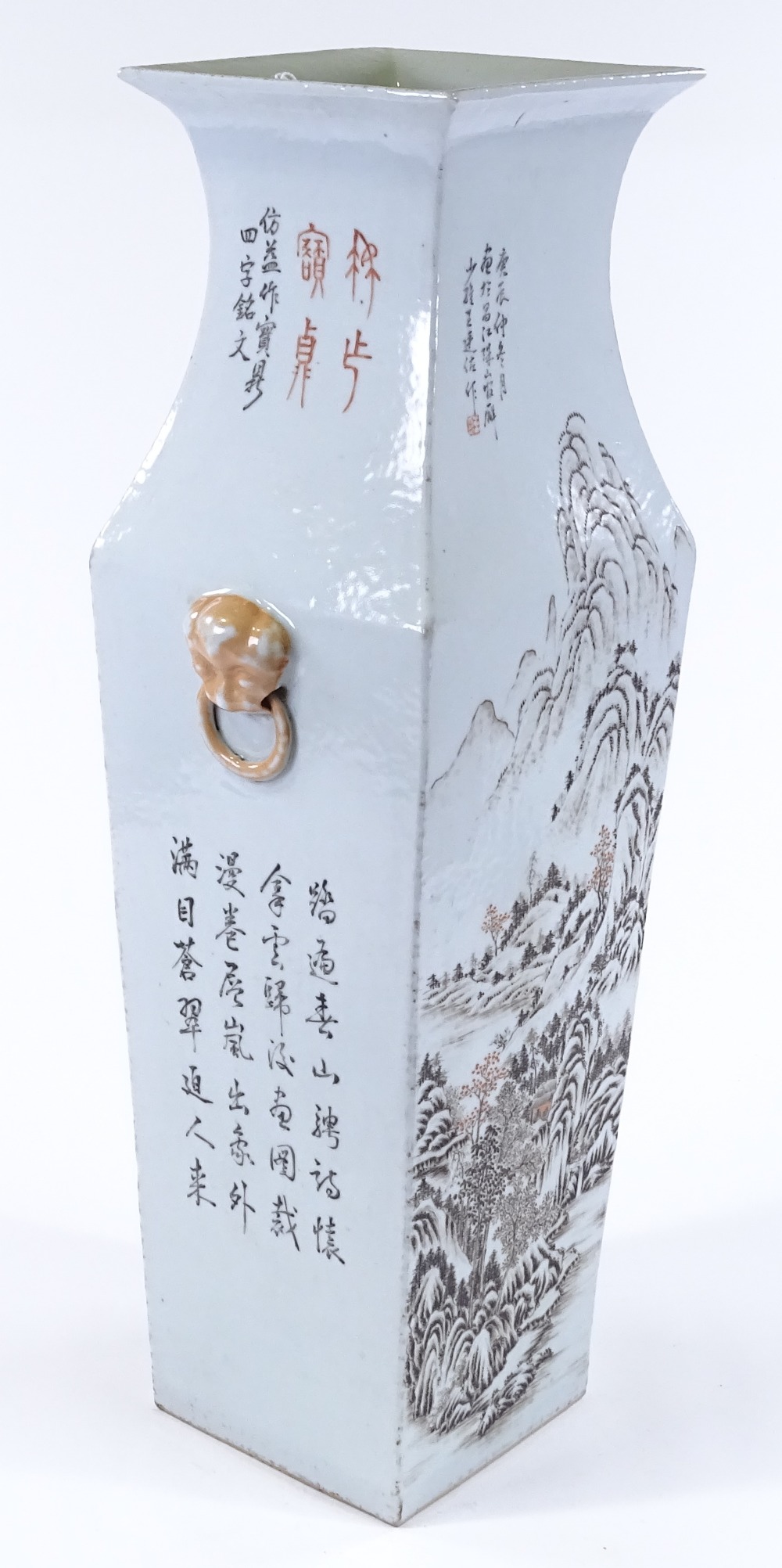 A Chinese porcelain square section vase with painted mountain landscape and text, height 57cm, rim