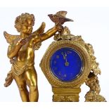 A 19th century French gilt-metal cased mantel clock, surmounted by a cherub holding a bird, blue