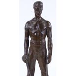 N Barabotti, patinated bronze sculpture of a workman holding an adze, signed on stone base,