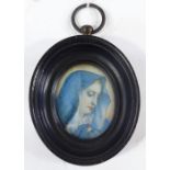 Miniature watercolour on ivory, study of the Virgin Mary, unsigned, ebonised frame, overall height