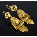 A pair of high carat gold pendant earrings, of geometric design with en tremblant hanging tassels,