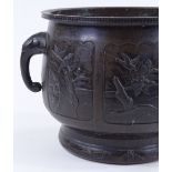 A Chinese relief cast bronze 2-handled jardiniere, with shaped moulded panels depicting exotic