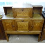 A Brynmawr Arts and Crafts Cotswold School oak sideboard, circa 1935, W118cm, H122cm, D46cm