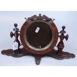 A First War Period brass inlaid toilet mirror with RFC Wings mount, on Bakelite plinth, framed