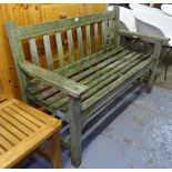 A weathered slatted garden bench, L129cm